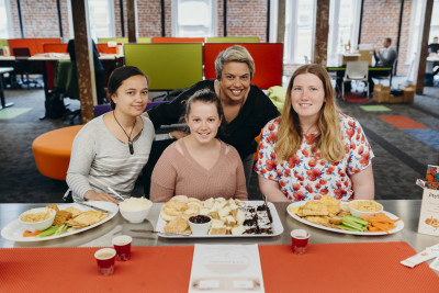 Innov8HQ Limited image of four people at a table with food platters