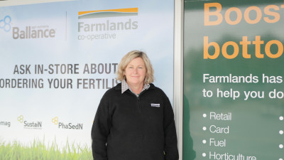 Farmlands Gore image of person in front of store